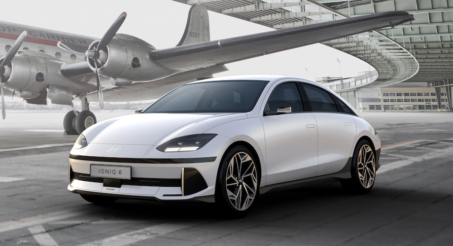 White Hyundai Ioniq 6 at an airbase front view 